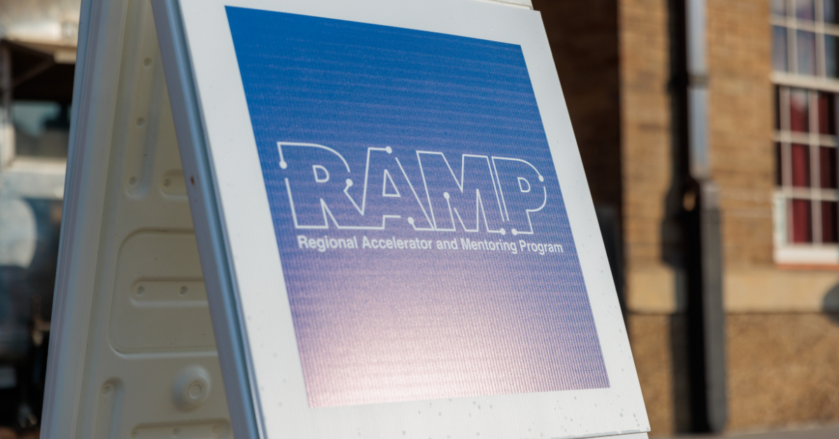 RAMP fall cohort logo on a sign